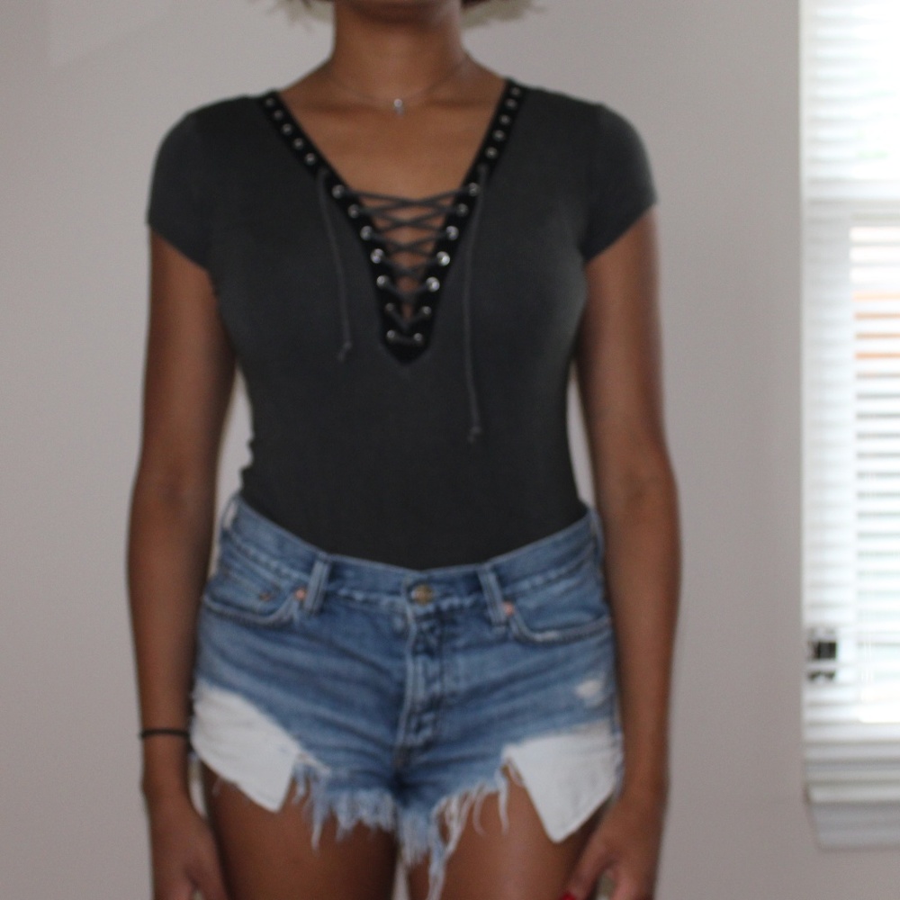 Leotard top with a snap button at the bottom